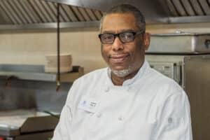 Chef in the kitchen at Norwood Towers